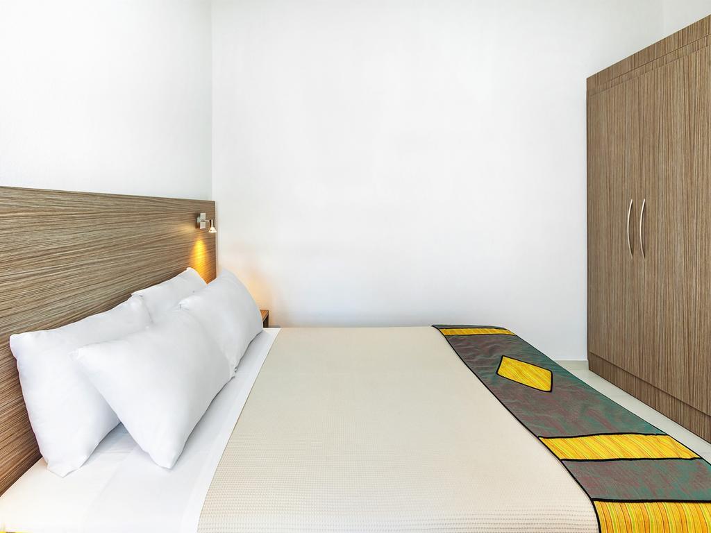 Xenios Dolphin Beach Hotel Possidi Quarto foto